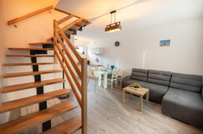 Spokojne Miejsce - domki - apartamenty nad morzem